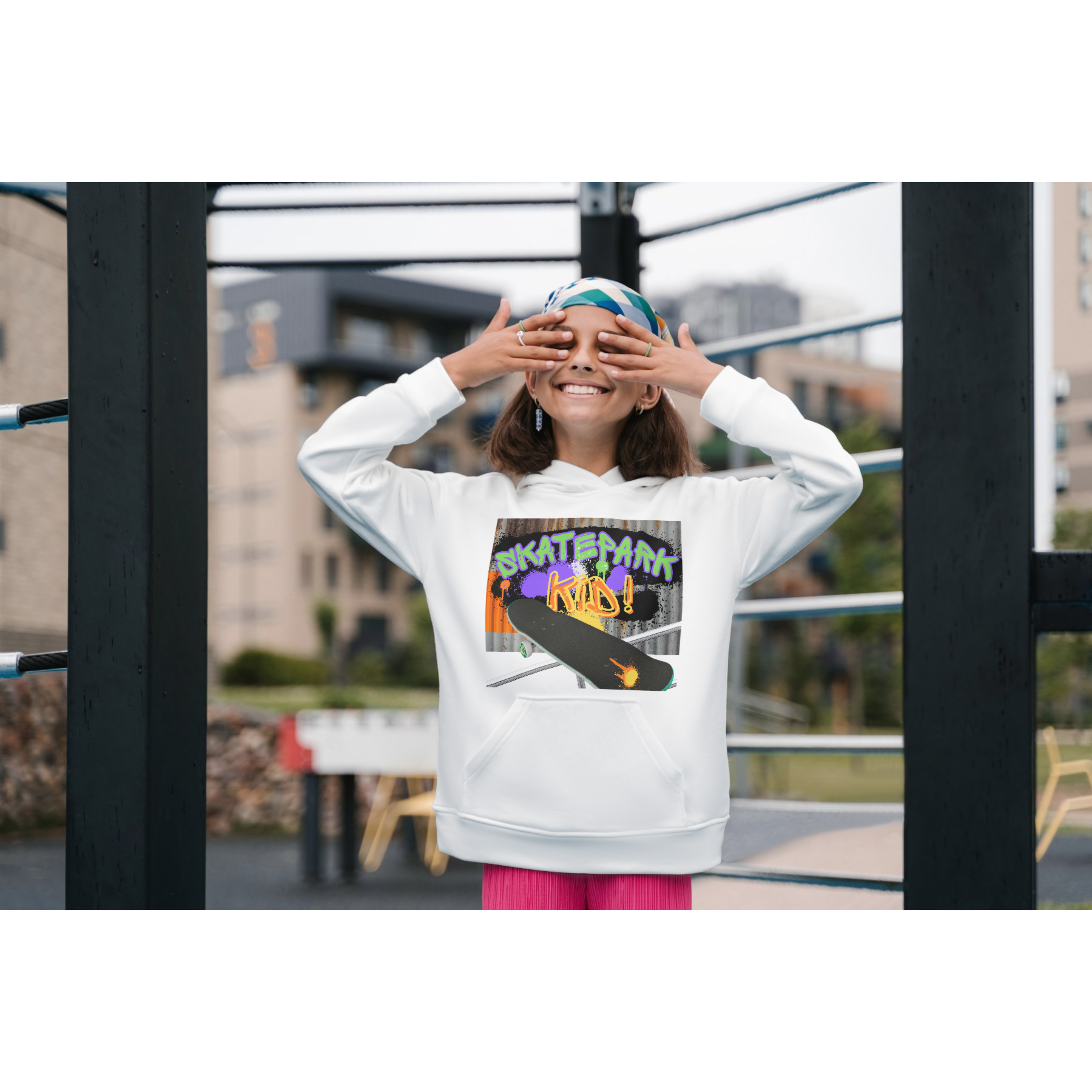 Person wearing Skatepark Kid! Hoodie `AWDis kids hoodie Skatepark Kid design, 80% cotton 20% polyester, EU safety compliant, arctic white, front view`