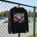 Skatepark Kid! Hoodie `AWDis kids hoodie Skatepark Kid design, 80% cotton 20% polyester, EU safety compliant, deep black, front view` hanging up in a skateboard park