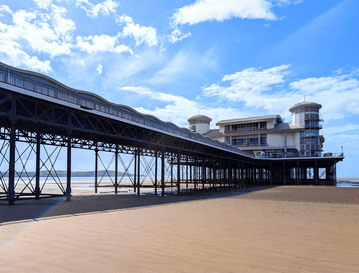 Coastal pier digital art with long wooden structure and waterfront buildings