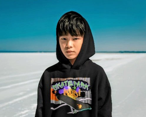 Person wearing Skatepark Kid! Hoodie `AWDis kids hoodie Skatepark Kid design, 80% cotton 20% polyester, EU safety compliant, deep black, front view`